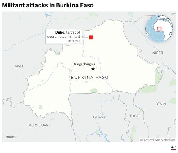 The map above highlights Burkina Faso on the African continent and shows the location of recent militant attacks. (AP Graphic)