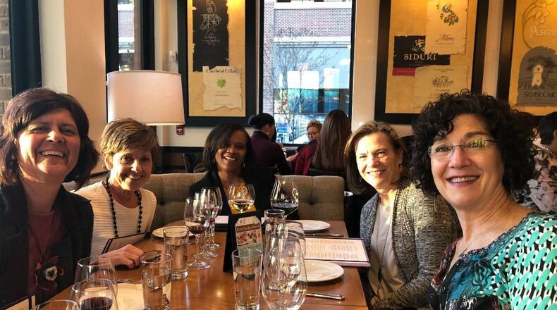 Gail Collier-Glover (center) enjoys a happy hour outing with other members of the Transition Network: (from left) Lynn Anderson, Alyse Pribish, Bonnie Cole and Debbie Cohen Levy. CONTRIBUTED