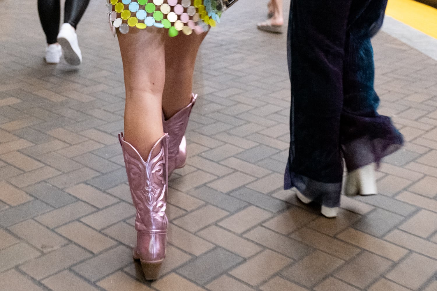 Fans head to the Taylor Swift and Janet Jackson concerts in downtown Atlanta on Friday, April 28, 2023.   (Ben Gray / Ben@BenGray.com)