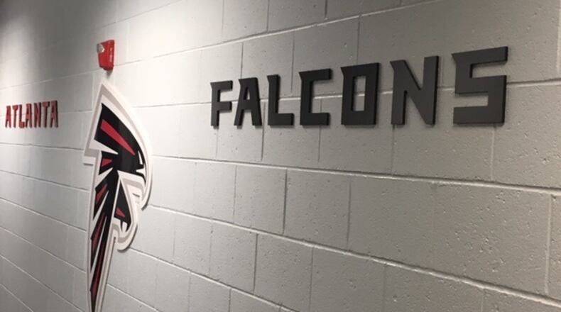 Here’s a shot outside of the team’s meeting room in Flowery Branch. The team’s draft war room is upstairs above this room which is off limits to the non-team affiliated/working media. (By D. Orlando Ledbetter/dledbetter@ajc.com)