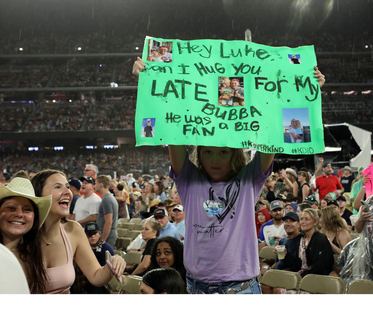 Luke Bryan rocked rainy and sold out Truist Park on Saturday, August 17, 2024 on his Mind of a Country Boy Tour. His support acts were Bailey Zimmerman, Kameron Marlowe and American Idol winner Chayce Beckham. 
Robb Cohen for the Atlanta Journal-Constitution