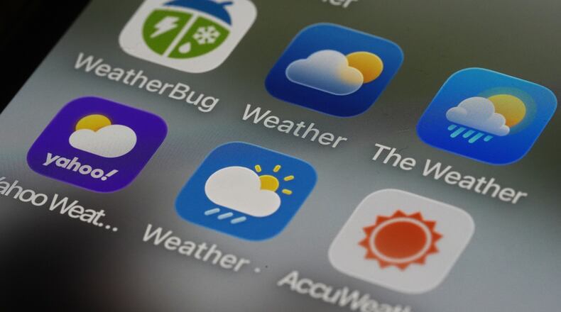 This photo shows various weather apps arranged on a smartphone in Glenside, Pa., Thursday, Jan. 22, 2026. (AP Photo/Matt Rourke)