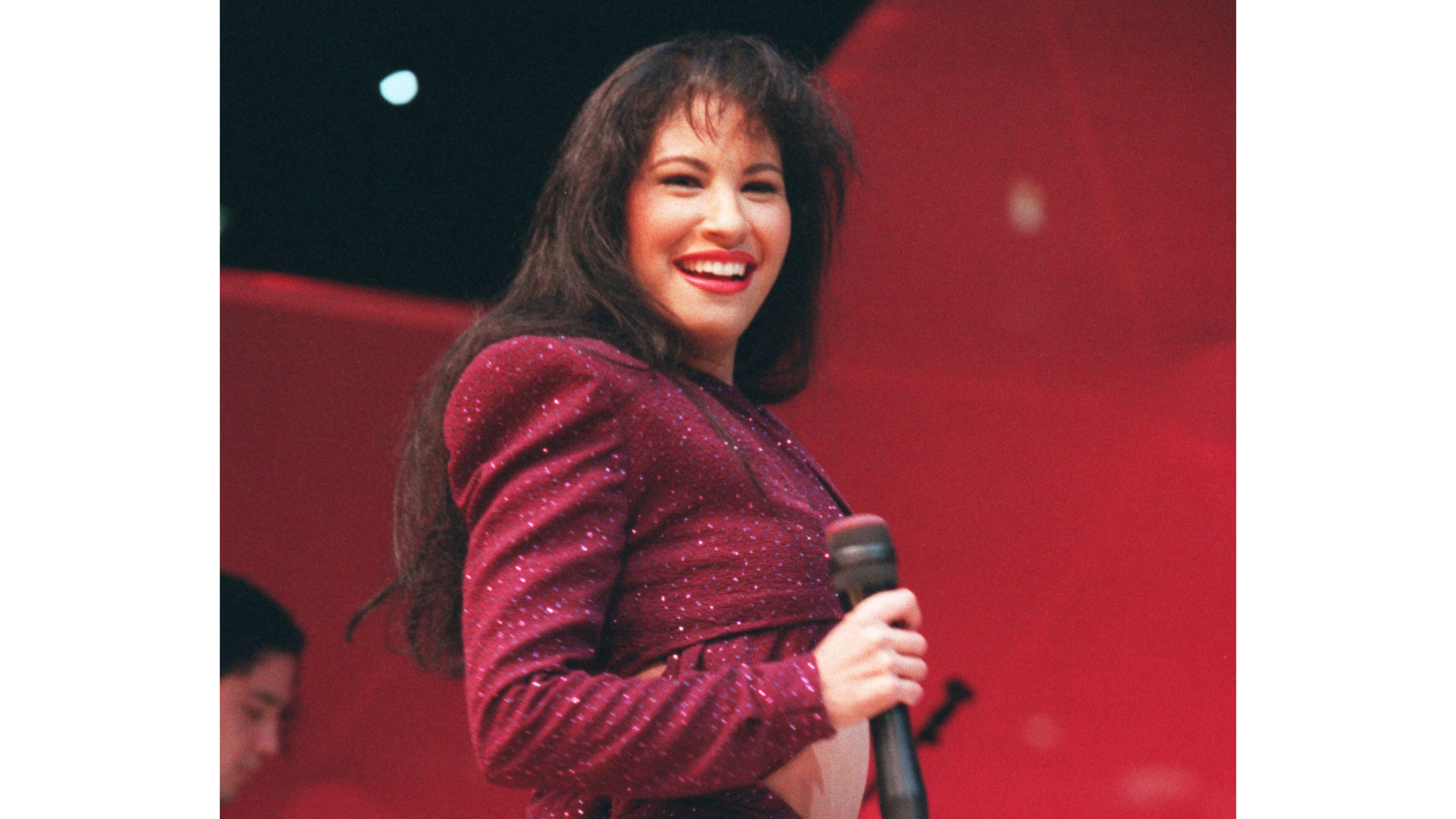 FILE - Tejano singer Selena Quintanilla performs at the Astrodome during the Houston Livestock Show and Rodeo on Feb. 26, 1995. (John Everett/Houston Chronicle via AP)