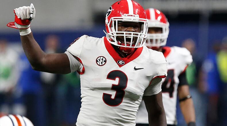 Georgia linebacker Roquan Smith (3) yells out commands before Auburn runs a play during the SEC title game in Atlanta.