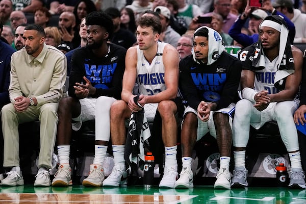 Orlando Magic players watch from the bench while trailing the Boston Celtics during the second half in game 5 of a first-round NBA playoff basketball series, Tuesday, April 29, 2025, in Boston. (AP Photo/Charles Krupa)