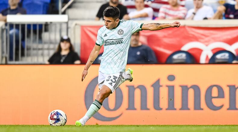 Atlanta United midfielder Thiago Almada kicks the ball during the match against New York Red Bulls at Red Bull Arena in Harrison, NJ on Saturday June 24, 2023. (Photo by Mitchell Martin/Atlanta United)