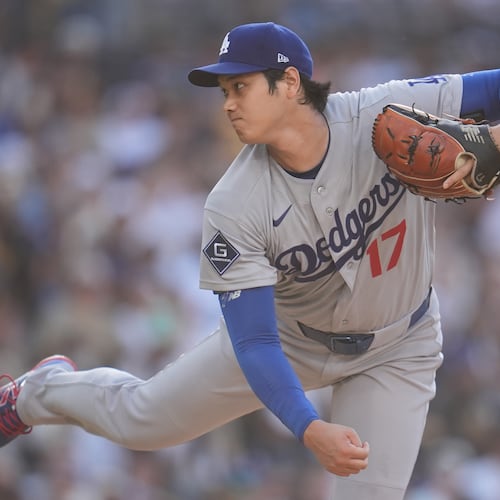 Los Angeles Dodgers starting pitcher Shohei Ohtani works against a San Diego Padres batter during the first inning of a baseball game Wednesday, May 20, 2026, in San Diego. (AP Photo/Gregory Bull)