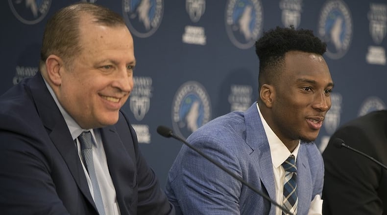 Josh Okogie, with Timberwolves head coach Tom Thibodeau, during his introductory press conference last month.