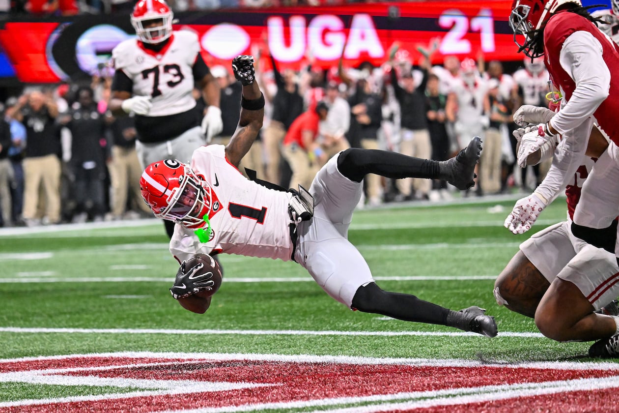 Georgia wide receiver Zachariah Branch — pictured scoring against Alabama in the SEC championship game in December — was arrested early Sunday morning in Athens on misdemeanor charges. (Hyosub Shin/AJC 2025)