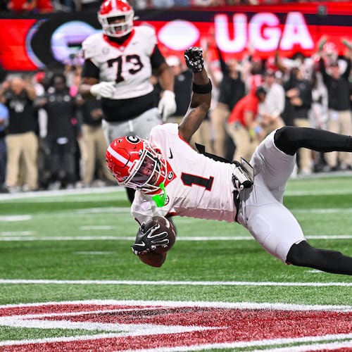 Georgia wide receiver Zachariah Branch — pictured scoring against Alabama in the SEC championship game in December — was arrested early Sunday morning in Athens on misdemeanor charges. (Hyosub Shin/AJC 2025)