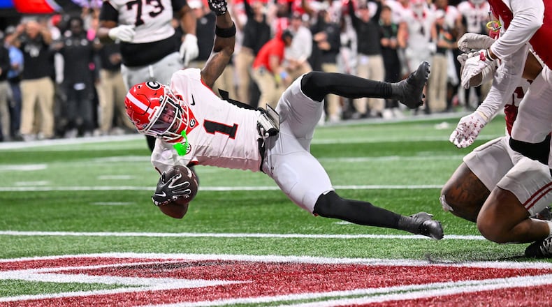 Georgia wide receiver Zachariah Branch — pictured scoring against Alabama in the SEC championship game in December — was arrested early Sunday morning in Athens on misdemeanor charges. (Hyosub Shin/AJC 2025)