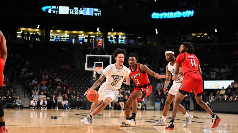 Georgia Tech guard Michael Devoe drives to the basket against N.C. State on Tuesday night at McCamish Pavilion. Devoe led Tech with 18 points on 7-for-17 shooting. (Anthony McClellan/Georgia Tech Athletics)