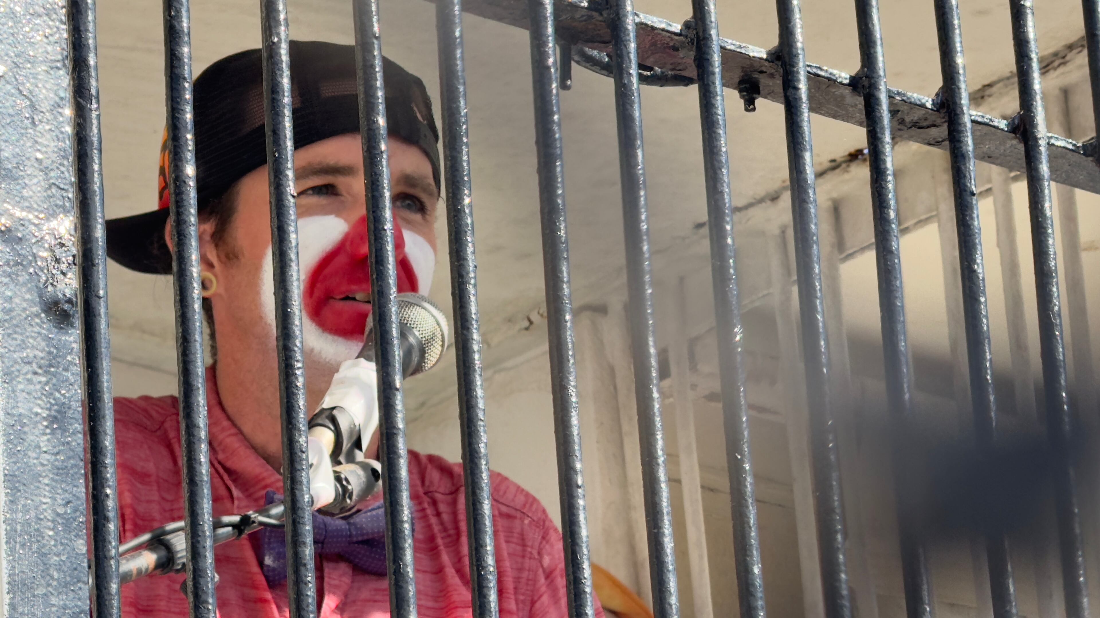 Dunking-booth clown Justin Smith, of Arizona, travels the country on the carnival circuit, with the most recent stop the Georgia National Fair in Perry. (Joe Kovac Jr./AJC)