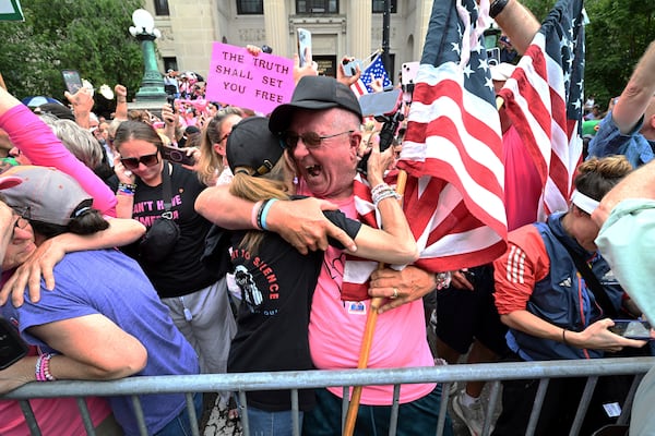 Supporters of Karen Read react after she was found not guilty of second-degree murder on Wednesday, June 18, 2025, in Dedham, Mass. (AP Photo/Josh Reynolds)
