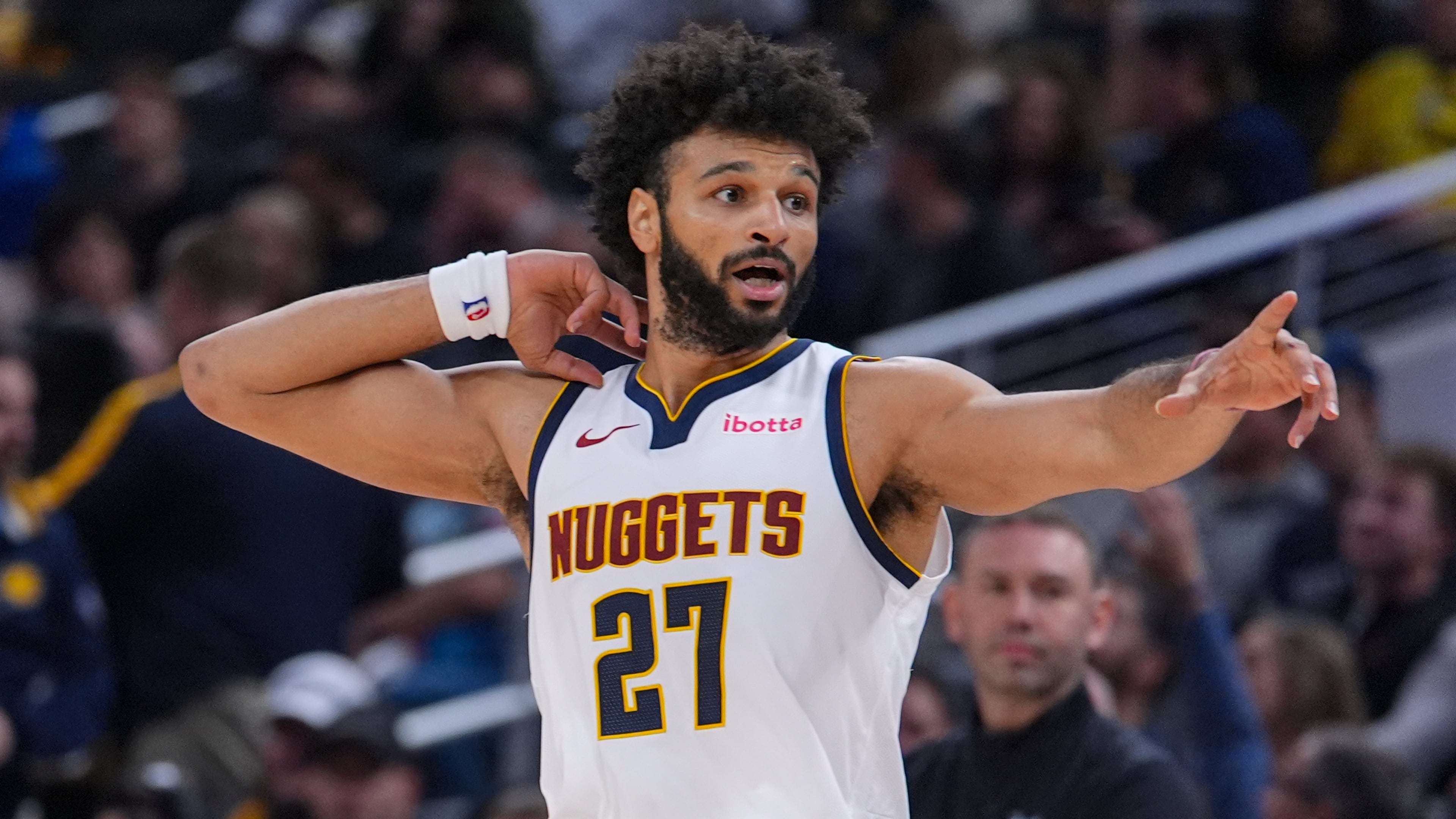 Denver Nuggets guard Jamal Murray (27) reacts after scoring his 50th point against the Indiana Pacers during the second half of an NBA basketball game in Indianapolis, Wednesday, Dec. 3, 2025. (AP Photo/Michael Conroy)