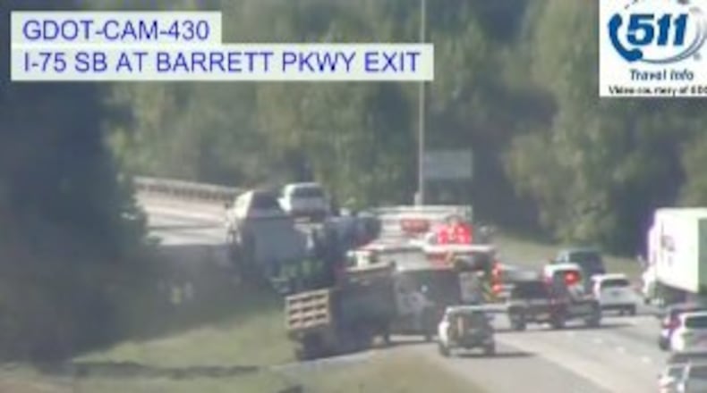 A crash blocked most lanes and caused heavy delays of I-75 southbound Friday, April 29, 2016, at Barrett Parkway. (Credit: WSB 24-hour Traffic Center)