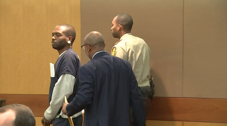 Uber Eats driver Robert Bivines appeared in court Tuesday. He is accused of killing Ryan Thornton outside his Buckhead condominium.
