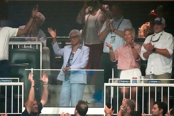 Billye Aaron, wife of baseball great Hank Aaron waves during at the MLB baseball All-Star game between the American League and National League, Tuesday, July 15, 2025, in Atlanta. (AP Photo/Mike Stewart)