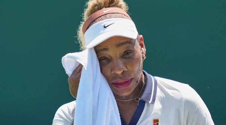Serena Williams of the United States wipes sweat during a practice session ahead of the Wimbledon Tennis Championships, in London, Wednesday, June 24, 2026. (AP Photo/Kin Cheung)