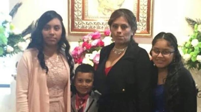 Juana Flores-Velazquez with her three U.S.-born children before she was deported this month to Mexico. Her sister, Norma Flores, is now raising the children. “Ever since my sister was detained, her children have suffered a lot. They cry and ask about her. I hope that the government can provide her with an opportunity to be with her children again.” Family photo