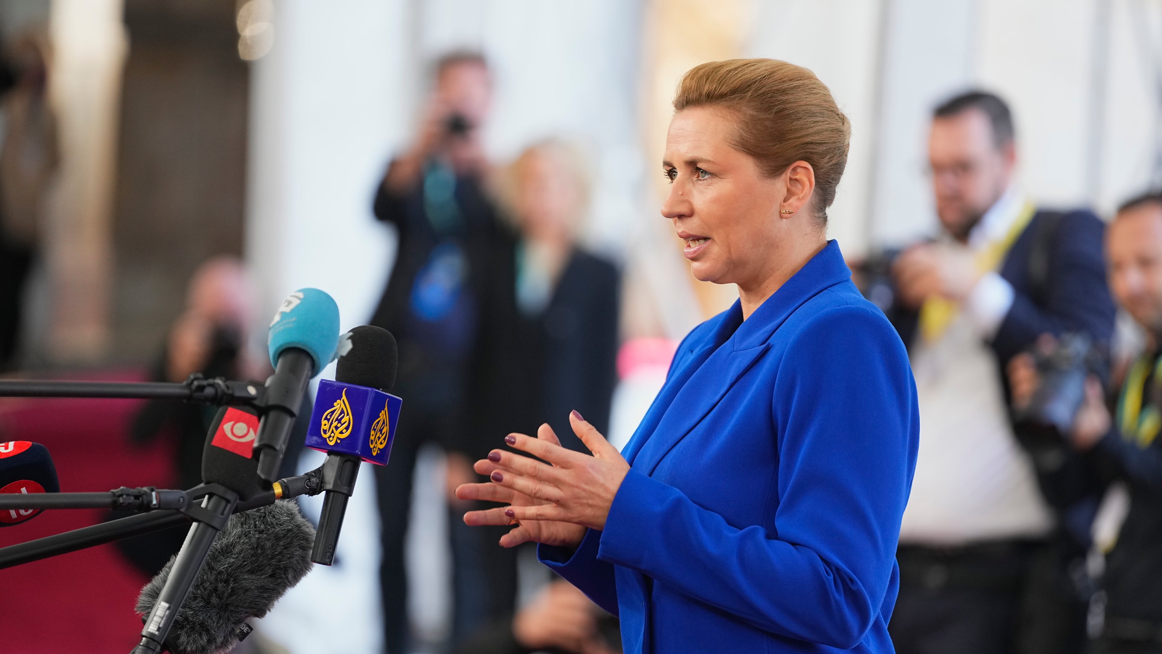 Denmark's Prime Minister Mette Frederiksen speaks to journalists as she arrives for an informal summit in the Danish parliament at Christiansborg Castle in Copenhagen, on Wednesday, Oct. 1, 2025. (Thomas Traasdahl/Ritzau Scanpix via AP)