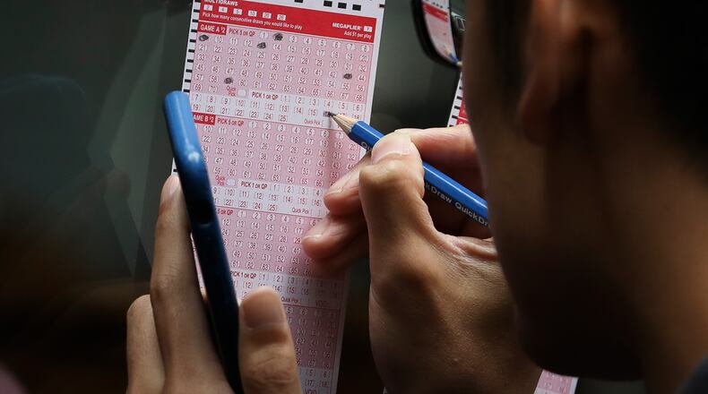 A furloughed government worker won a $26 million lottery jackpot just before shutdown. She recently claimed her winnings.