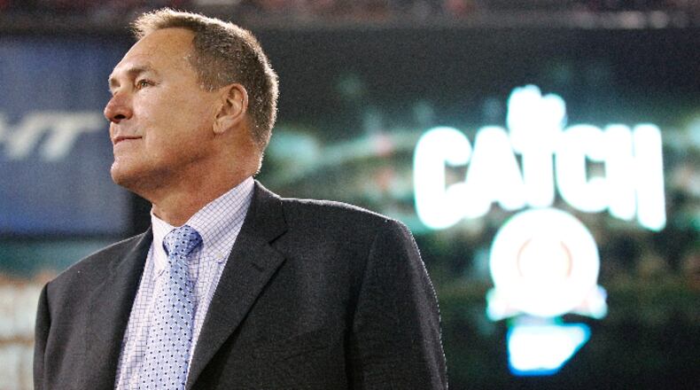 FILE - In this Dec. 23, 2013, file photo, former San Francisco 49ers wide receiver Dwight Clark is honored at halftime of an NFL football game between the 49ers and the Atlanta Falcons in San Francisco. (AP Photo/Tony Avelar, File)