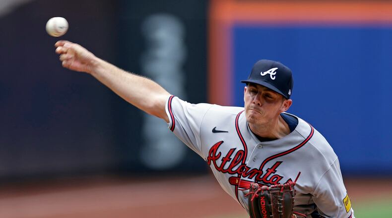 Atlanta Braves pitcher Allan Winans throws against the New York Mets during the fourth inning in the first baseball game of a doubleheader on Saturday, Aug. 12, 2023, in New York. (AP Photo/Adam Hunger)