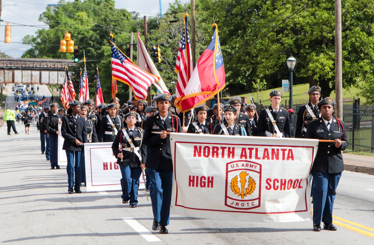 The North Atlanta High School JROTC marches during the Atlanta Public School parade on Saturday, April 22, 2023. The parade celebrated the 150th anniversary of Atlanta Public Schools and featured students, teachers and other members of the APS community. CHRISTINA MATACOTTA FOR THE ATLANTA JOURNAL-CONSTITUTION