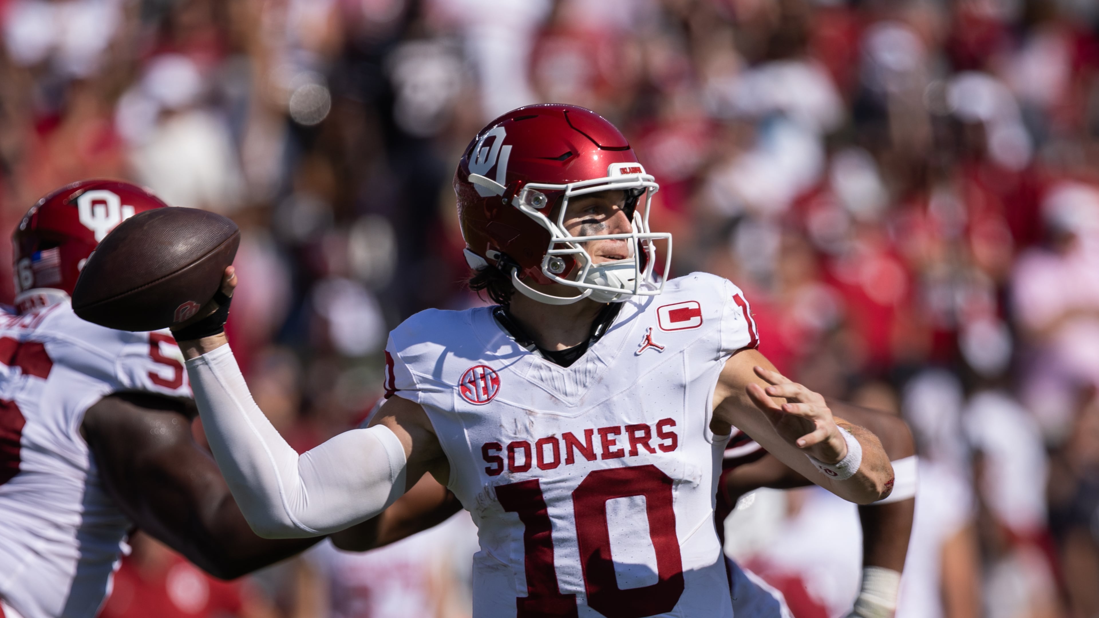 Oklahoma quarterback John Mateer (10) throws a pass during the second half of an NCAA college football game against South Carolina, Saturday, Oct. 18, 2025, in Columbia, S.C. (AP Photo/Scott Kinser)