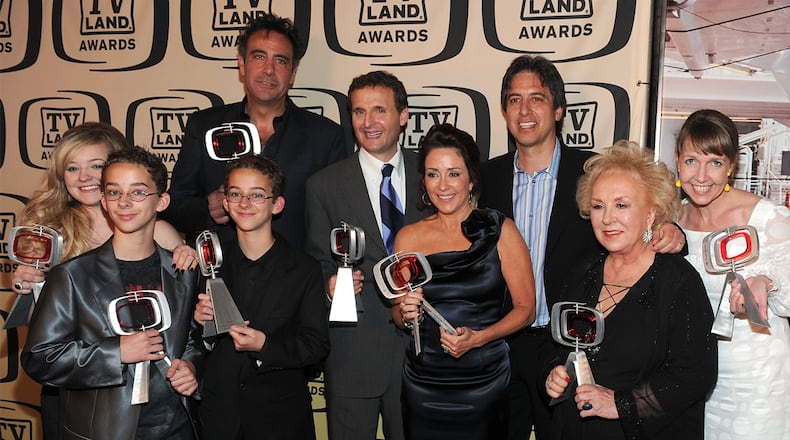 Sawyer Sweeten (third from left, front row) died of an apparent suicide at age 19, on April 23, 2015. Sawyer was part of the popular show "Everybody Loves Raymond." This photo of the cast was taken five years earlier. (L-R) Actors Madylin Sweeten, Sullivan Sweeten, Sawyer Sweeten, Brad Garrett, producer Philip Rosenthal, and actors Patricia Heaton, Ray Romano, Doris Roberts, and Monica Horan (Photo by Alberto E. Rodriguez/Getty Images)