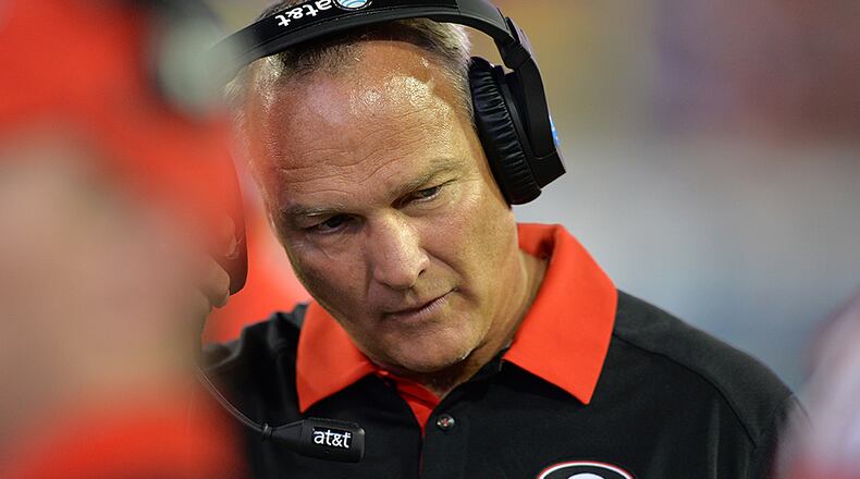 Georgia head coach Mark Richt pulls of the headset late in the 4th quarter during Georgia/ Florida matchup Saturday October 31, 2015 in Jacksonville, FL . BRANT SANDERLIN/BSANDERLIN@AJC.COM