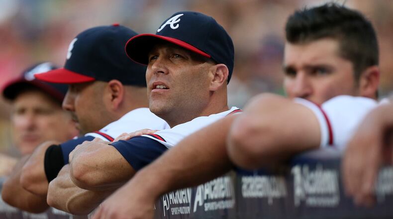 Tim Hudson is in the dugout to watch during the first inning against the Mets in their MLB baseball game on Tuesday, Sept. 3, 2013, in Atlanta. CURTIS COMPTON / CCOMPTON@AJC.COM