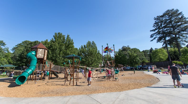 Families play at Ashford Park, one of Brookhaven’s 11 parks and the center of the Ashford Park neighborhood. (Jenni Girtman / Atlanta Event Photography)
