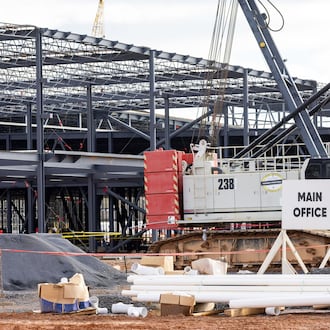 A new solar manufacturing plant owned by Qcells is under construction in Cartersville. (Arvin Temkar/AJC)