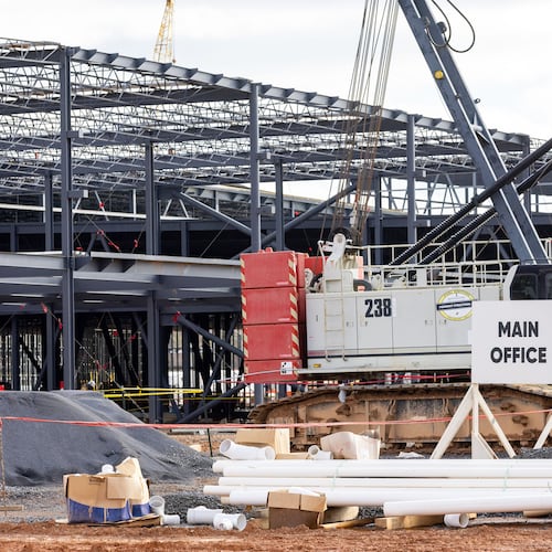 A new solar manufacturing plant owned by Qcells is under construction in Cartersville. (Arvin Temkar/AJC)