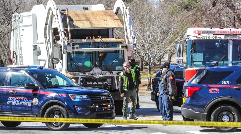 A pedestrian was killed Monday on a busy road in southwest Atlanta. The body was removed from the scene along Campbellton Road near the Andrew and Walter Young Family YMCA. (John Spink / John.Spink@ajc.com)