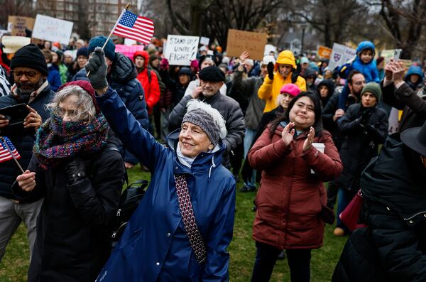 FILE - Hundreds of demonstrators gather on Cambridge Common during a rally at the historic park in Cambridge, Mass., Saturday, April 12, 2025, calling on Harvard University to resist what organizers described as attempts by President Trump to influence the institution. (Erin Clark/The Boston Globe via AP, File)