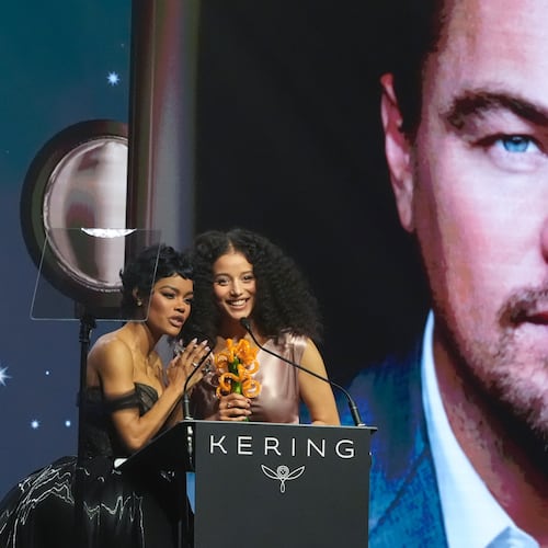 Teyana Taylor, left, and Chase Infiniti accept the desert palm achievement award on behlaf of Leonardo DiCaprio during the 37th Palm Springs International Film Festival Film Awards on Saturday, Jan. 3, 2026 at Palm Springs Convention Center in Palm Springs, Calif. (AP Photo/Chris Pizzello)