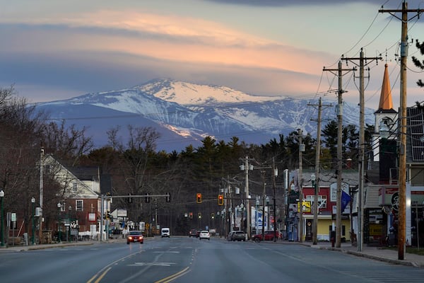 FILE - Mount Washington dominates the scene in this view of the business district in the village of North Conway, N.H., Thursday, April 13, 2023. (AP Photo/Robert F. Bukaty, File)