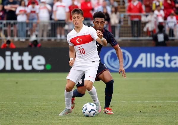 Turkey forward Arda Güler (10) controls the ball ahead of United States defender Alex Freeman (16) during the second half of an international friendly soccer game, Saturday, June 7, 2025, in East Hartford, Conn. (AP Photo/Mary Schwalm)