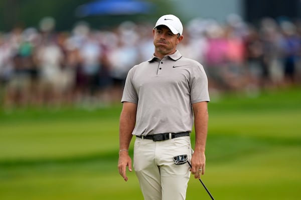 Rory McIlroy, of Northern Ireland, reacts after missing a putt on the eighth hole during the third round of the U.S. Open golf tournament at Oakmont Country Club Saturday, June 14, 2025, in Oakmont, Pa. (AP Photo/Carolyn Kaster)