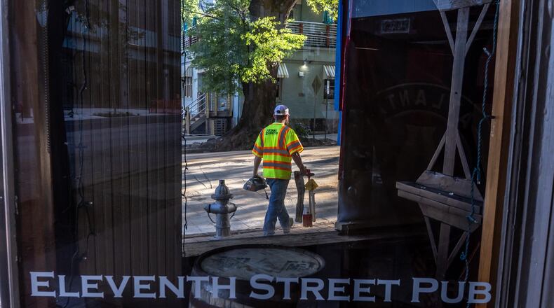 Eleventh Street Pub will reopen July 26, nearly two months after it was forced to closed due to a water main break. (John Spink/AJC)