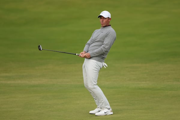 Rory McIlroy of Northern Ireland reacts after putting on the 18th green during the first round of the British Open golf championship at the Royal Portrush Golf Club, Northern Ireland, Thursday, July 17, 2025. (AP Photo/Peter Morrison)