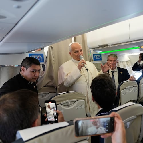Pope Leo XIV talks to journalists aboard the papal flight from Rome to Madrid, Saturday, June 6, 2026, on the occasion of his apostolic journey to Spain. (AP Photo/Alessandra Tarantino, Pool)