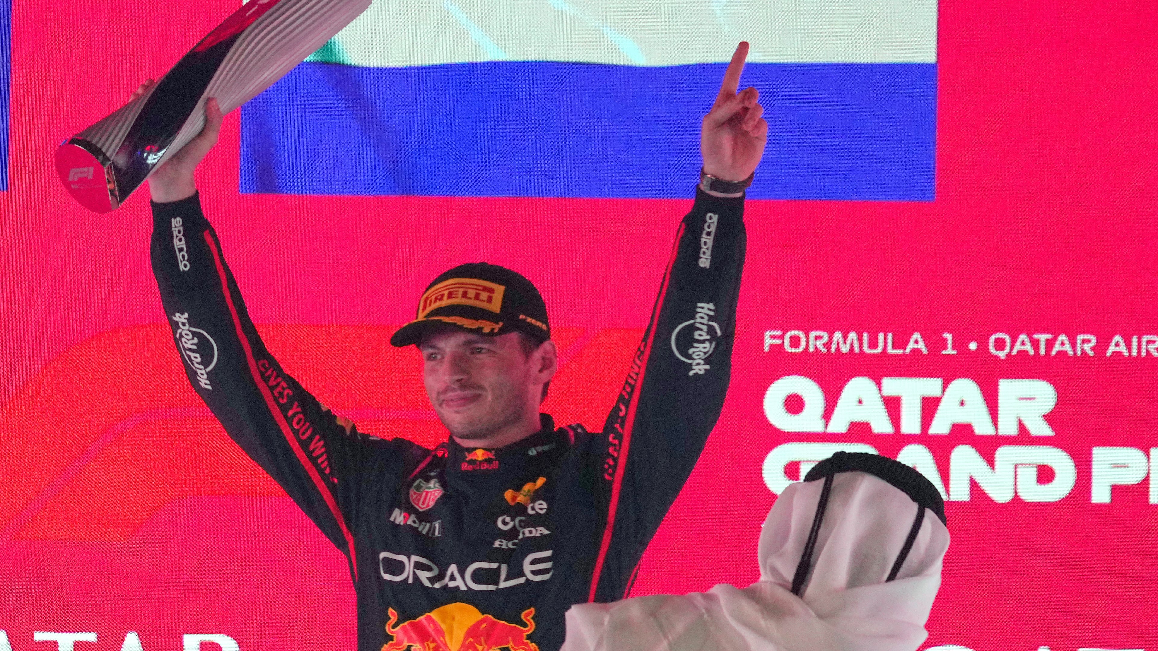 Red Bull driver Max Verstappen of the Netherlands celebrates after winning the Qatar Formula One Grand Prix, in Lusail, Qatar, Sunday, Nov. 30, 2025.(AP Photo/Altaf Qadri)