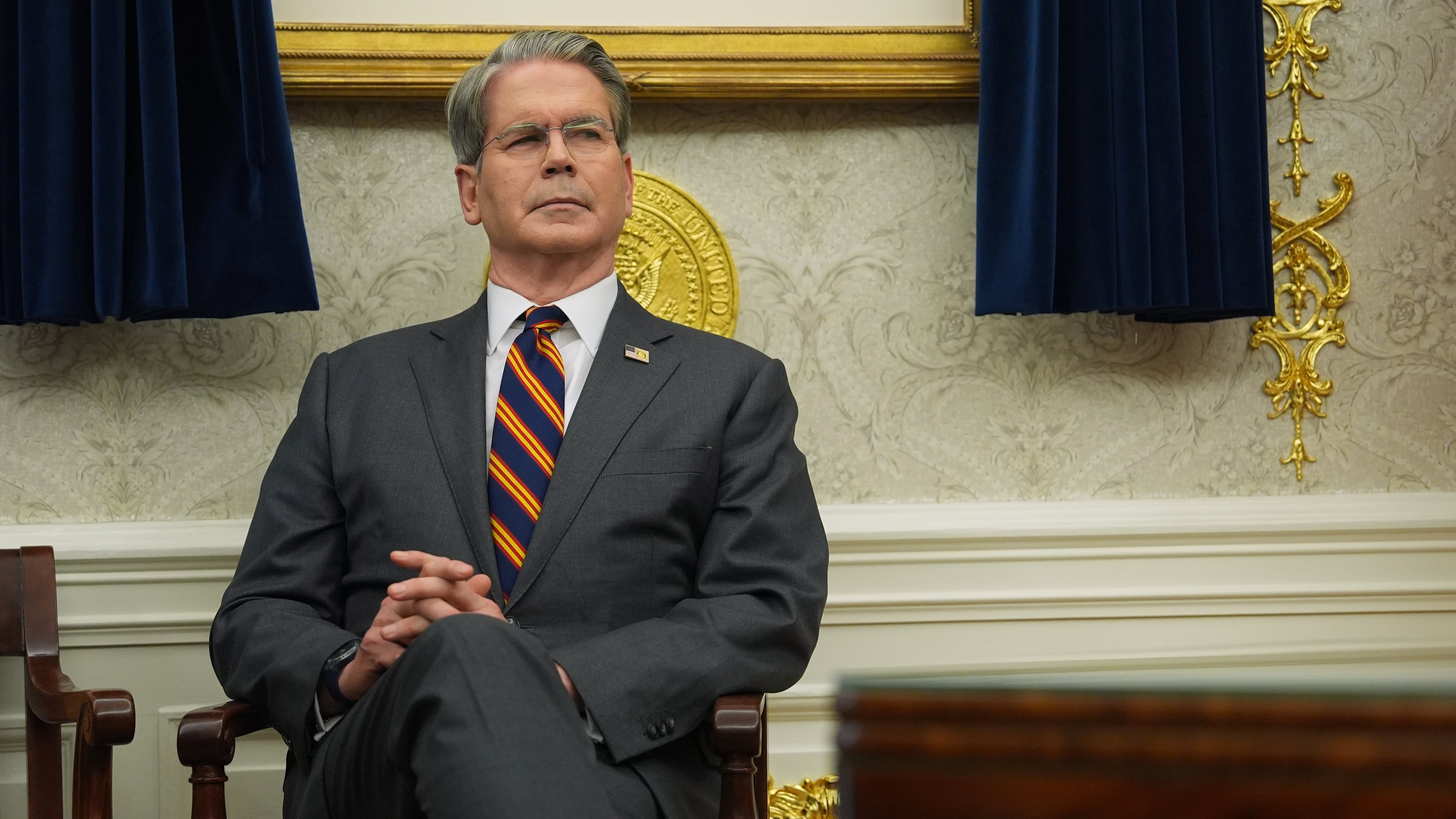 Treasury Secretary Scott Bessent listens as President Donald Trump talks after meeting with New York City Mayor-elect Zohran Mamdani in the Oval Office of the White House, Friday, Nov. 21, 2025, in Washington. (AP Photo/Evan Vucci)
