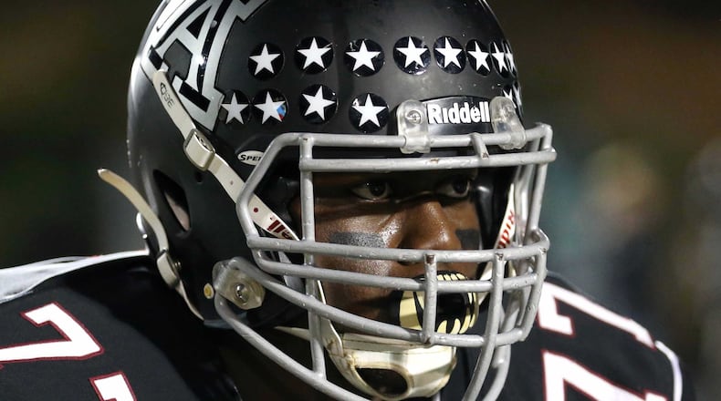 Junior Uzebu, a 6-foot-6 offensive tackle from Alpharetta, announced that he will sign with Dana Holgerson and the West Virginia Mountaineers.