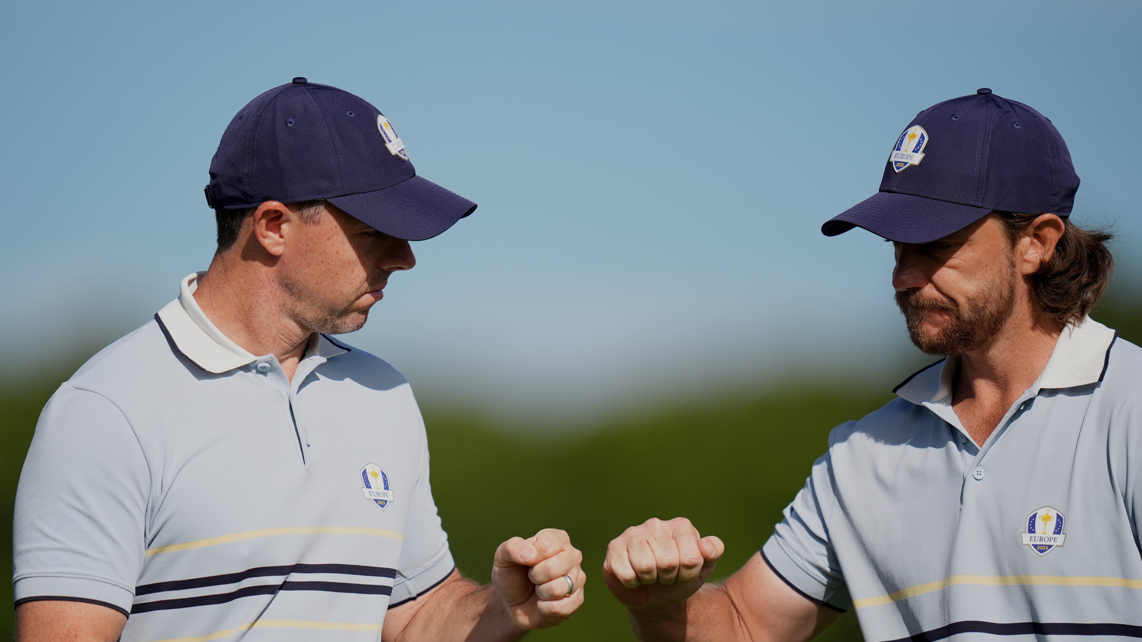 Europe's Tommy Fleetwood and Rory McIlroy celebrate on the 11th hole at Bethpage Black golf course during the Ryder Cup golf tournament, Friday, Sept. 26, 2025, in Farmingdale, N.Y. (AP Photo/Seth Wenig)