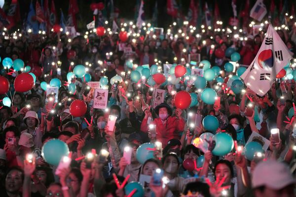 FILE - Supporters of Kim Moon Soo, presidential candidate for the People Power Party, attend a campaign rally in Seoul, South Korea, Monday, June 2, 2025. (AP Photo/Ahn Young-joon, File)